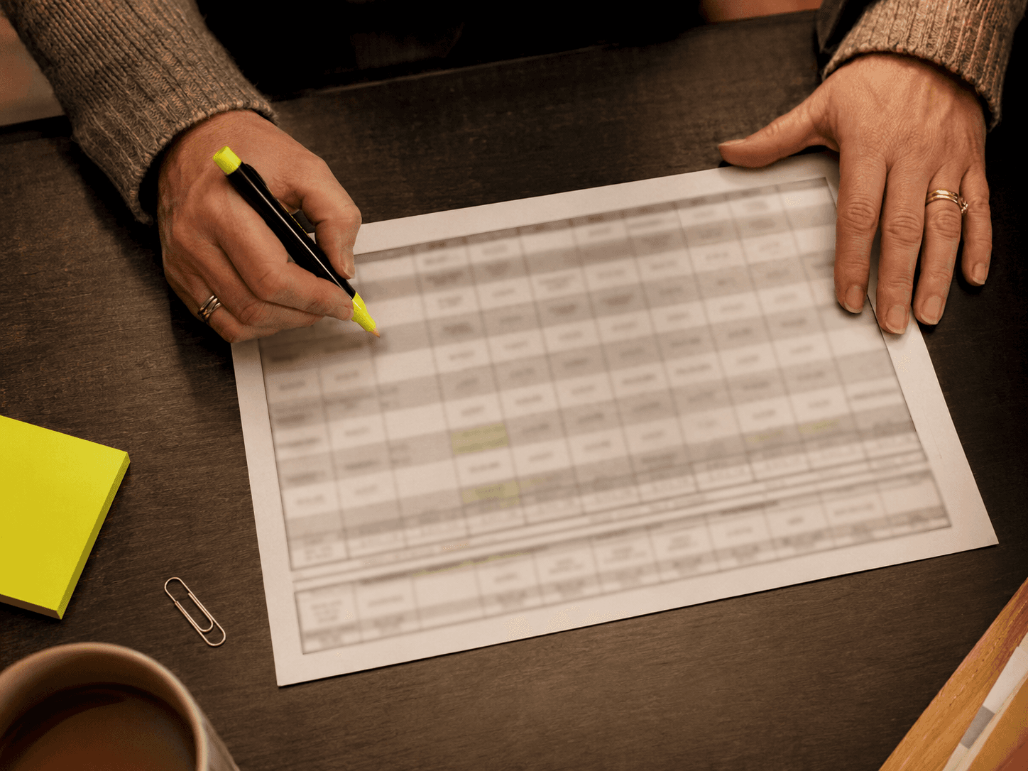 A shift schedule being reviewed and highlighted.